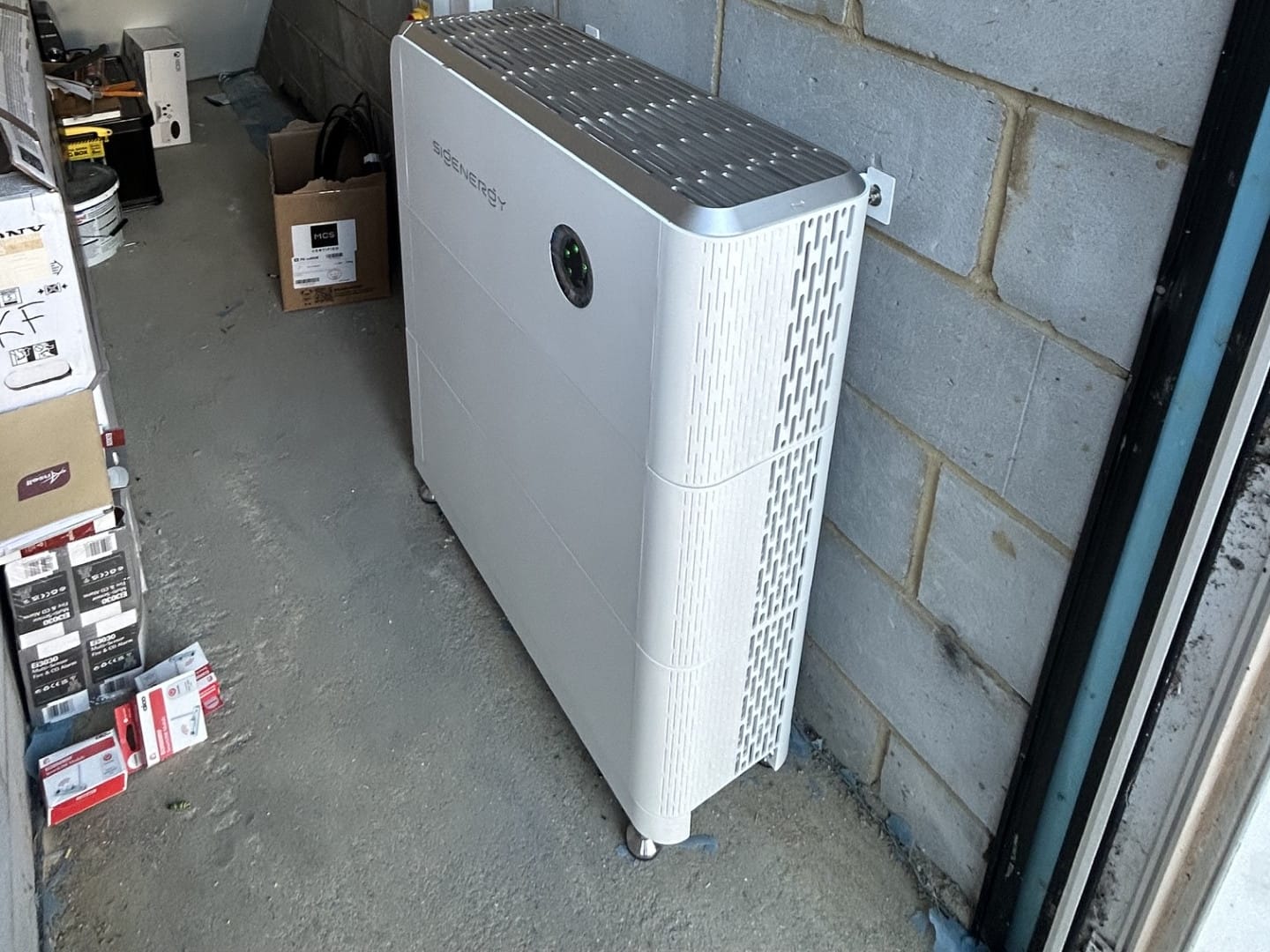 Home battery system installed in a garage by Athena