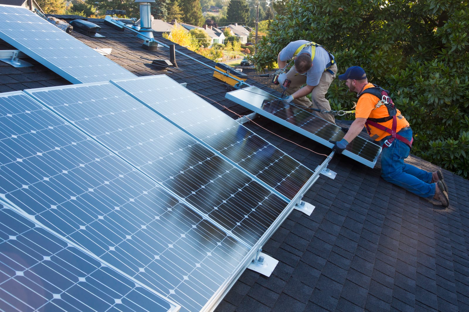 Man installing roof panels
