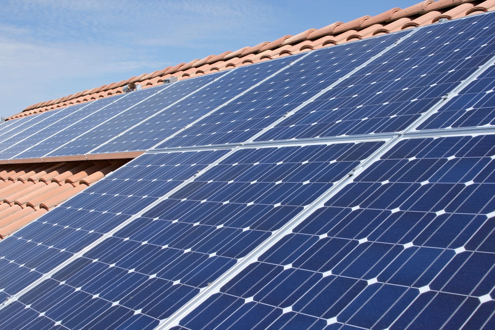 Residential solar panels in bright sun
